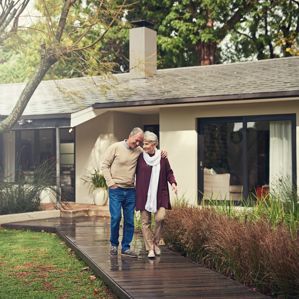 Enjoying the fresh air. Shot of a loving senior couple taking a walk outside